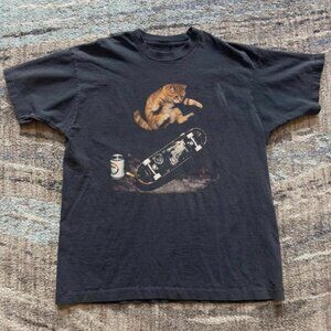 A SKATEBOARDING CAT T - SHIRT